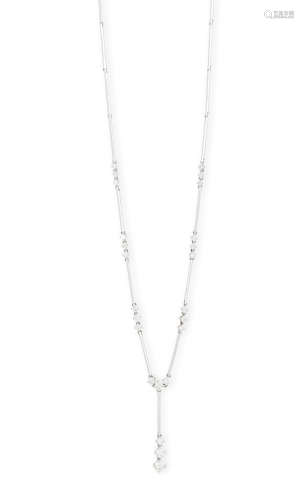 A DIAMOND NECKLACE, composed of graduated round brilliant-cut diamonds interspersed by millegrain
