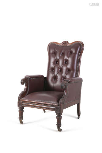 A GEORGE IV MAHOGANY FRAMED LIBRARY ARMCHAIR, upholstered in red buttoned hide, with gently out-