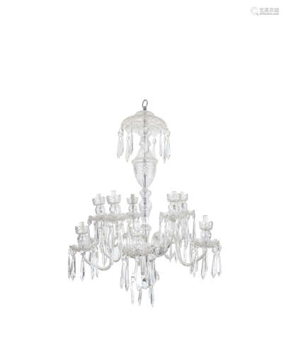 A WATERFORD CUT GLASS EIGHT LIGHT CHANDELIER, with domed corona and baluster centre column issuing
