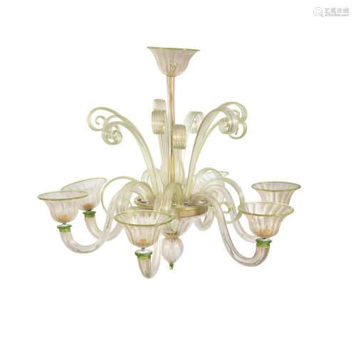 A VENETIAN BLOWN GLASS SIX LIGHT CHANDELIER, the reeded baluster column with vase shaped base