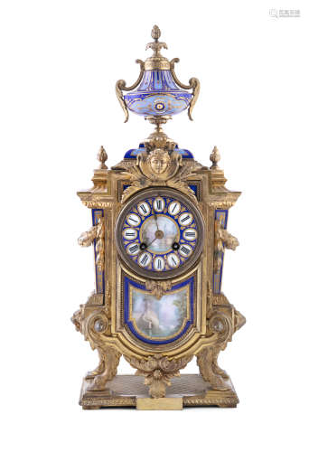A FRENCH GILT METAL AND ORMOLU MOUNTED MANTLE CLOCK, 19th century, of classical design, surmounted