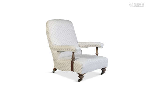 A VICTORIAN MAHOGANY FRAMED LOW CHAIR, the rectangular back, seat and arms upholstered in cream