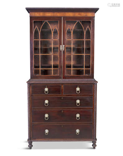 A GEORGE III MAHOGANY BOOKCASE, with arched lance glazed doors and shelved interior, above a chest