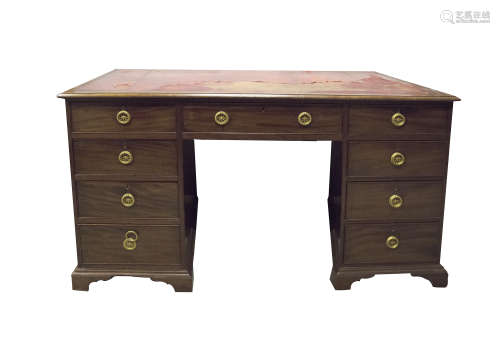 A 19TH CENTURY MAHOGANY RECTANGULAR PEDESTAL DESK, the top inset with leather scriver, above three