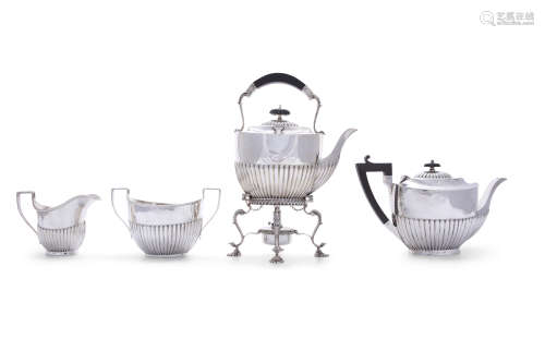 A MATCHED FOUR PIECE SILVER TEA SERVICE, comprising: a teapot, hot water pot on stand, sugar bowl