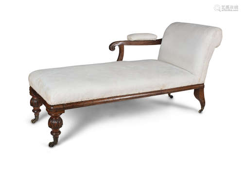 A WILLIAM IV MAHOGANY FRAMED CHAISE LONGUE, c.1830, upholstered in floral white damask, with