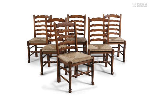 A SET OF SIX OAK LADDER BACK KITCHEN CHAIRS, 19th century, the rectangular backs with five-bar