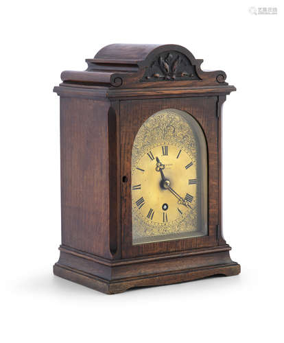 A MID 19TH CENTURY OAK CASED MANTLE CLOCK, by J. W Benson, Ludgate Hill, London, the arched