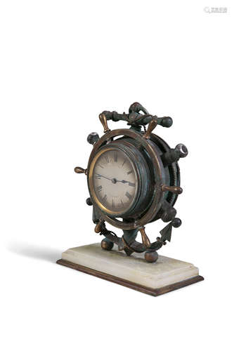 A NAUTICAL THEMED MANTLE CLOCK, with steel dial inscribed TK Austin & Co. Paris and Dublin, the case