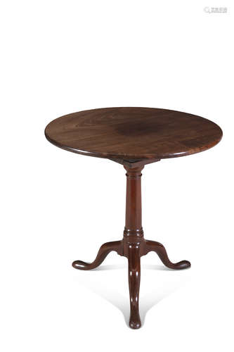 A GEORGE IV MAHOGANY CIRCULAR TILT TOP TEA TABLE, on turned centre pillar and tripod base.