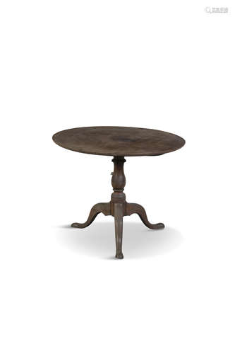 A 19TH CENTURY MAHOGANY CIRCULAR SNAP TOP SUPPER TABLE, the top with moulded rim, raised on turned