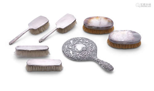 AN ART DECO SET OF SILVER BACKED VANITY BRUSHES, in simulated shagreen case; together with an
