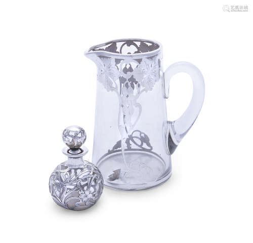 A 19TH CENTURY SILVER OVERLAID JUG, the pierced and engraved overlaid silver forming a fruiting