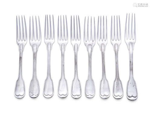 A MATCHED SET OF NINE DOUBLE THREADED FIDDLE PATTERN FRENCH WHITE METAL FORKS, engraved with