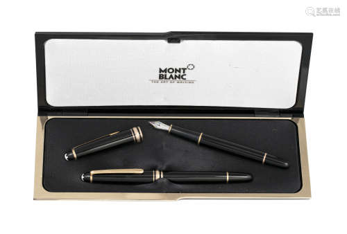 TWO FOUNTAIN PENS BY MONTBLANC, each black coloured with white Montblanc logo terminal and gilt