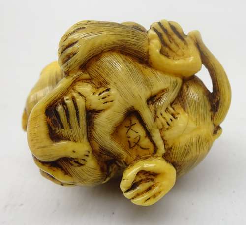 Japanese Meiji ivory Okimono carved as a family of Monkeys, signature to base,