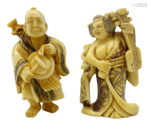 Two Japanese carved ivory Netsukes, both playing musical instruments, signed,