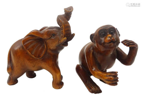 Japanese Meiji boxwood Netsuke carved as a monkey, L5cm and Elephant,