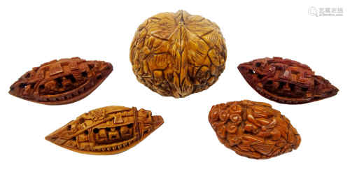 Japanese Meiji walnut shell carved with 'Thousand Faces' W4.