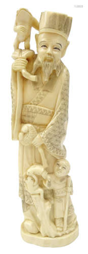 Japanese Meiji period carved ivory Okimono of man and son catching frogs,
