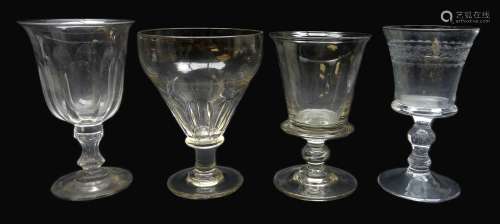 Four 19th century glass rummers, varying size and shape including a faceted example,