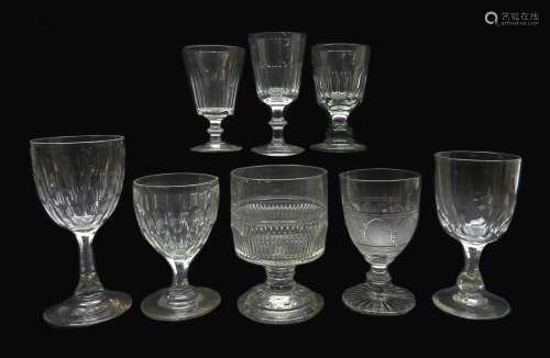 Eight 19th century glass goblets all having faceted or cut bowls, H18.
