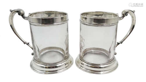 Pair Victorian glass and silver mounted tankards, scroll handle with etched monogram,