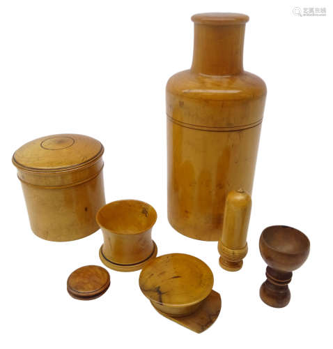 Collection of 19th century and later turned treen; Boxwood bottle case,