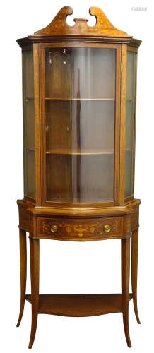 Edwardian inlaid mahogany serpentine front display cabinet,