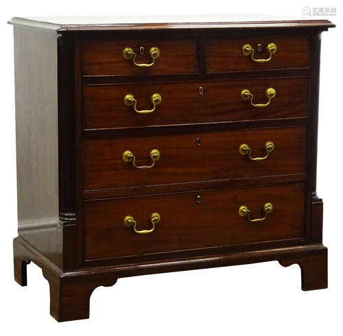 Small George III mahogany chest with moulded top above two short and three long cockbeaded drawers