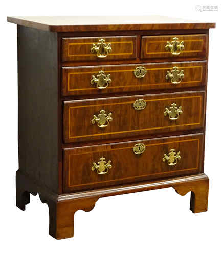 Small early 18th century walnut chest of two short and three long drawers with brass swan neck