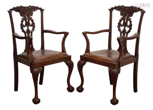 Pair of Chippendale style mahogany elbow chairs,