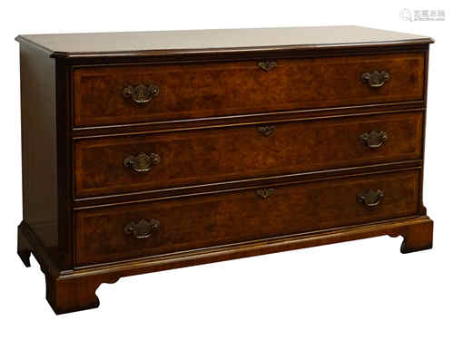 Reproduction bespoke walnut chest of three long drawers, with chased brass handles,