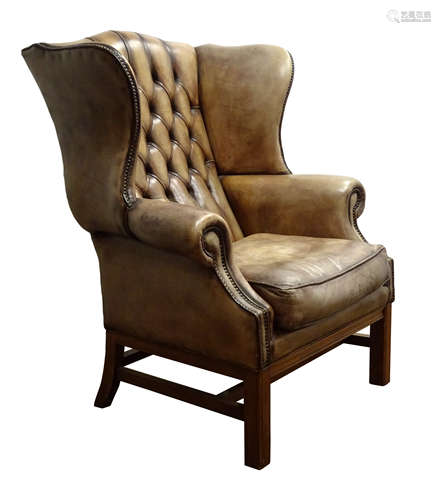 Large George lll style brass nailed leather wingback armchair,