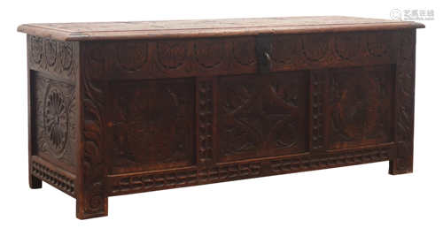 19th century oak coffer, all over carved with foliage, leafage and scrolls,