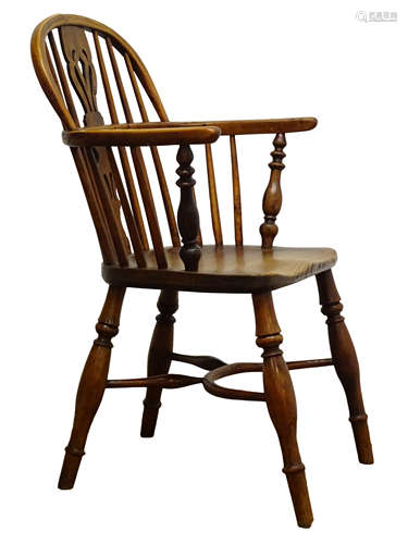 Early 19th century yew and elm low back Windsor armchair, pierced splat and stick back,