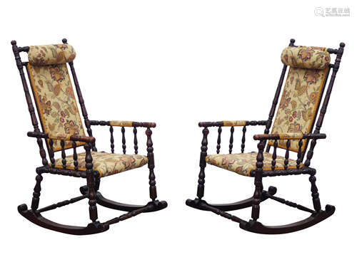 Pair stained beech American rocking armchairs, ring turned frames upholstered in floral fabric,