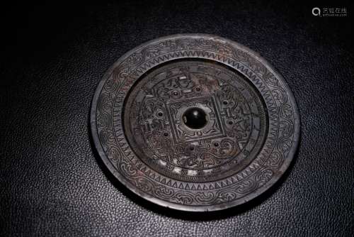 A Chinese Bronze Mirror