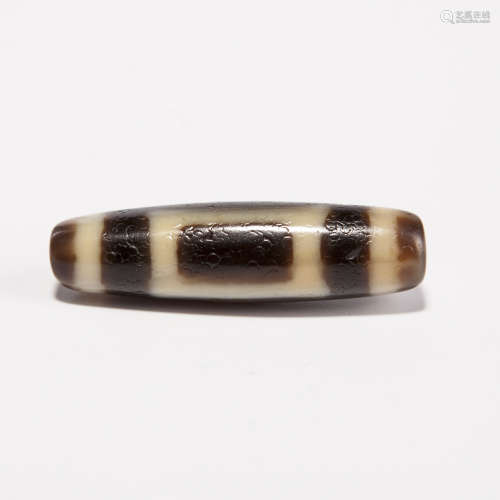 A Chinese Carved Agate DZI Bead