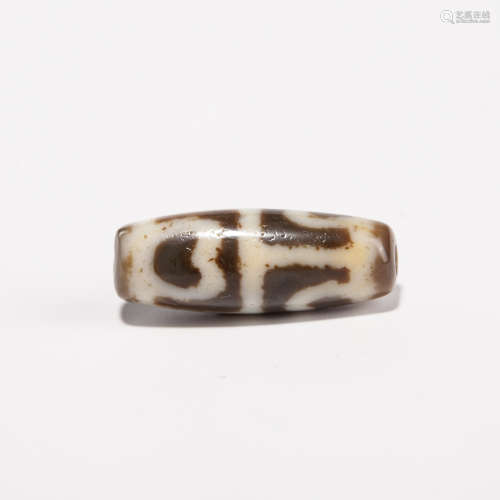 A Chinese Carved Agate DZI Bead
