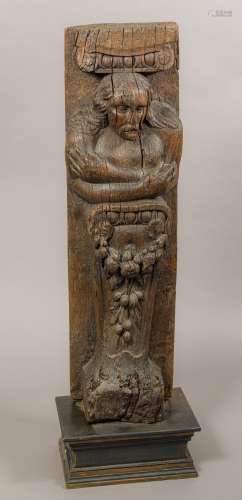 A fine 15th/16th century carved oak architectural upright Well carved with the torso of bearded