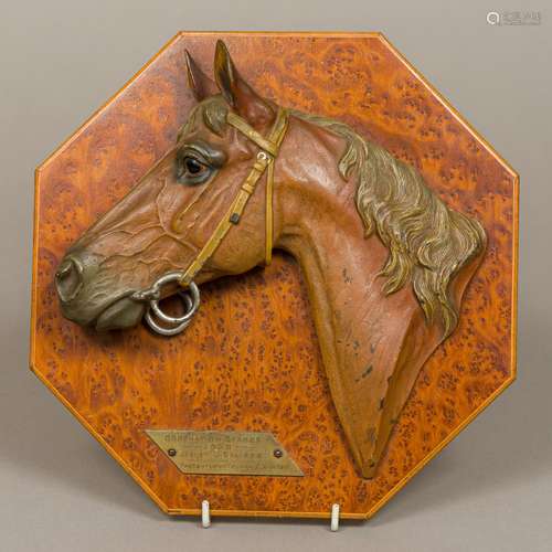 An early 20th century cold painted bronze animalier plaque Modelled as a racehorse's head,