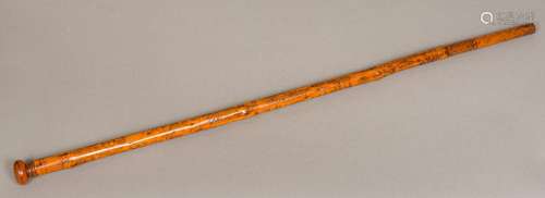 A 19th century Folk Art engraved treen walking stick Decorated in the round with figures in