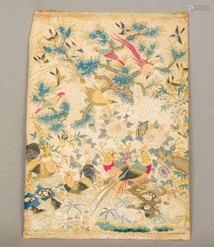 An 18th century Chinese embroidered silk panel Decorated throughout with various pairs of birds and