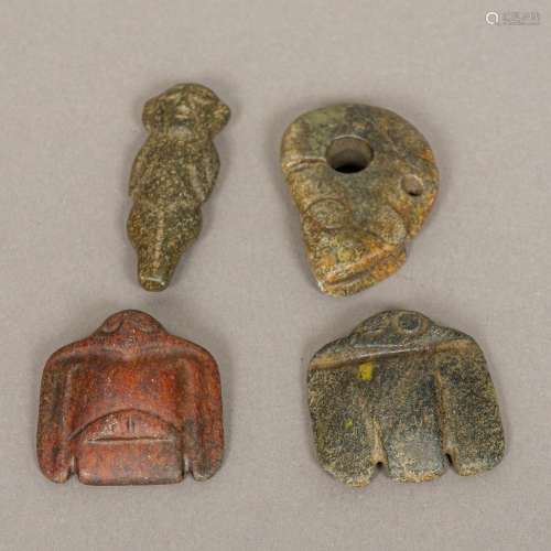 Four Chinese hardstone archaistic carvings of Neolithic period Comprising: stylised bird pendants,