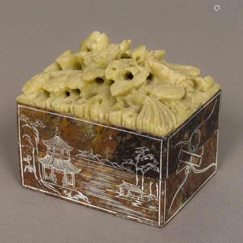 A Chinese carved soapstone box and cover Worked with a dragon and a phoenix above incised river