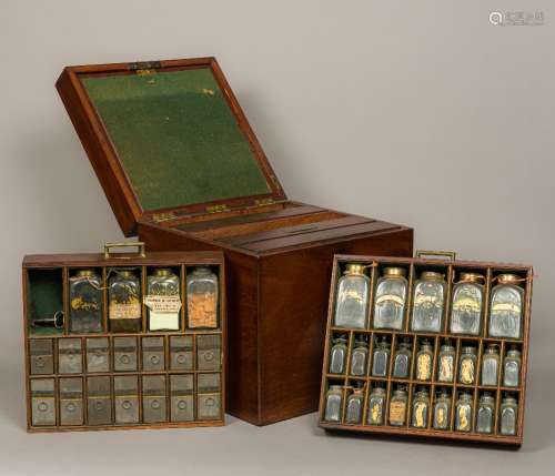 A 19th century mahogany travelling apothecary case Of hinged square section form,