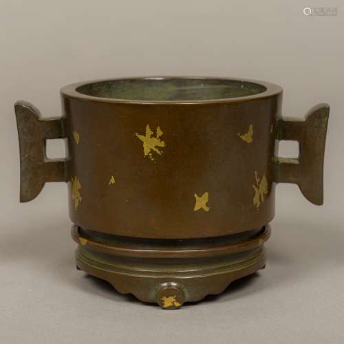 A Chinese patinated bronze gold splash censer on stand Of cylindrical form with twin lug handles,