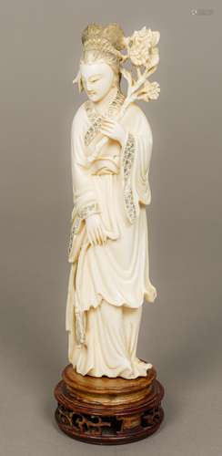 A late 19th/early 20th century Chinese carved ivory figure of Guanyin Typically worked. 26.