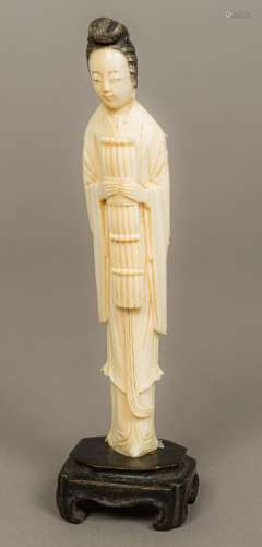 A late 19th/early 20th century Chinese carved and stained ivory figure of a musician 21.